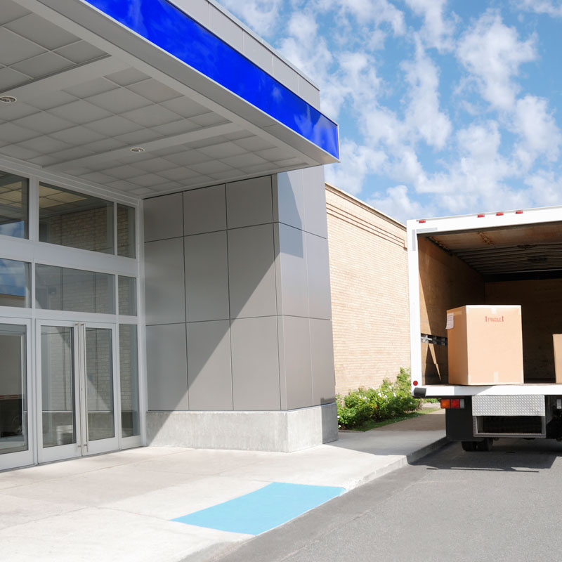 commercial building with moving truck